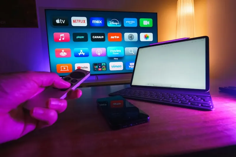 Remote controls and streaming devices arranged on a coffee table